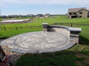Circular Patio and Stone Wall Norwalk Seasonal - Des Moines, Iowa