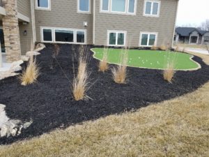 Custom Mulch Garden around Putting Green Norwalk Seasonal - Des Moines, Iowa