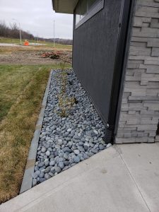 Rock Landscaping Along House Norwalk Seasonal - Des Moines, Iowa