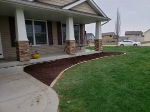 Front Yard Brick Lined Mulch Garden Norwalk Seasonal - Des Moines, Iowa