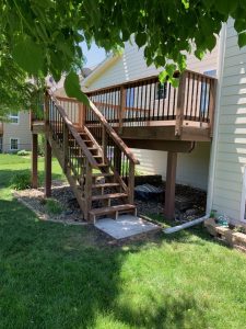 Backyard Deck Build Large Multi Level Retaining Wall by Norwalk Seasonal - Des Moines, Iowa