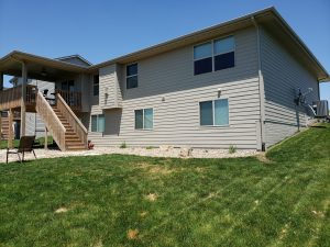 Backyard Makeover Large Multi Level Retaining Wall by Norwalk Seasonal - Des Moines, Iowa