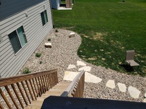 Stone Slap Walkway over Rock Large Multi Level Retaining Wall by Norwalk Seasonal - Des Moines, Iowa