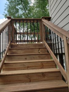 Wooden and Metal Railway Large Multi Level Retaining Wall by Norwalk Seasonal - Des Moines, Iowa