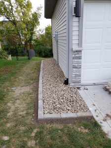 Rock and Brick Landscaping Large Multi Level Retaining Wall by Norwalk Seasonal - Des Moines, Iowa