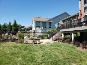 Large Backyard Makeover Large Multi Level Retaining Wall by Norwalk Seasonal - Des Moines, Iowa