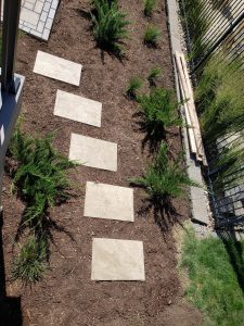 Stone Walkway Backyard Large Multi Level Retaining Wall by Norwalk Seasonal - Des Moines, Iowa