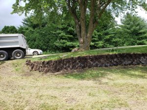 Before Retaining Wall Build Large Multi Level Retaining Wall by Norwalk Seasonal - Des Moines, Iowa