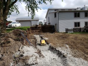 In Progress Retaining Wall Build Large Multi Level Retaining Wall by Norwalk Seasonal - Des Moines, Iowa