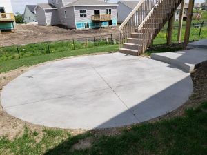 Large Circular Patio Large Multi Level Retaining Wall by Norwalk Seasonal - Des Moines, Iowa