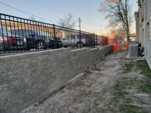 Large stone retaining wall by Norwalk Seasonal - Des Moines, Iowa