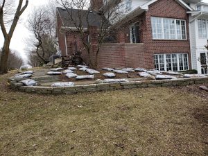 Landscaping and mulch front yard by Norwalk Seasonal - Des Moines, Iowa
