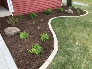 Front Yard Mulch Garden by Norwalk Seasonal - Des Moines, Iowa