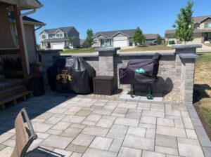 Backyard Brick Privacy Wall by Norwalk Seasonal - Des Moines, Iowa