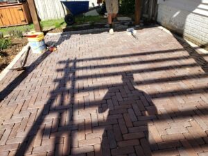 Custom Brick Patio Landing by Norwalk Seasonal - Des Moines, Iowa