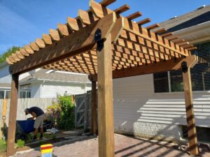 Wooden Patio Pergola by Norwalk Seasonal - Des Moines, Iowa