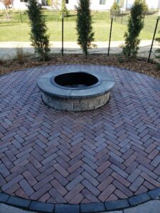 Stone Firepit with Brick Patio by Norwalk Seasonal - Des Moines, Iowa