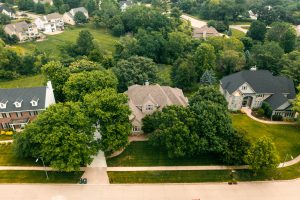 Aerial View of a mowed lawn and houses