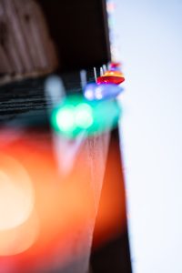 Christmas lights closeup on a gutter
